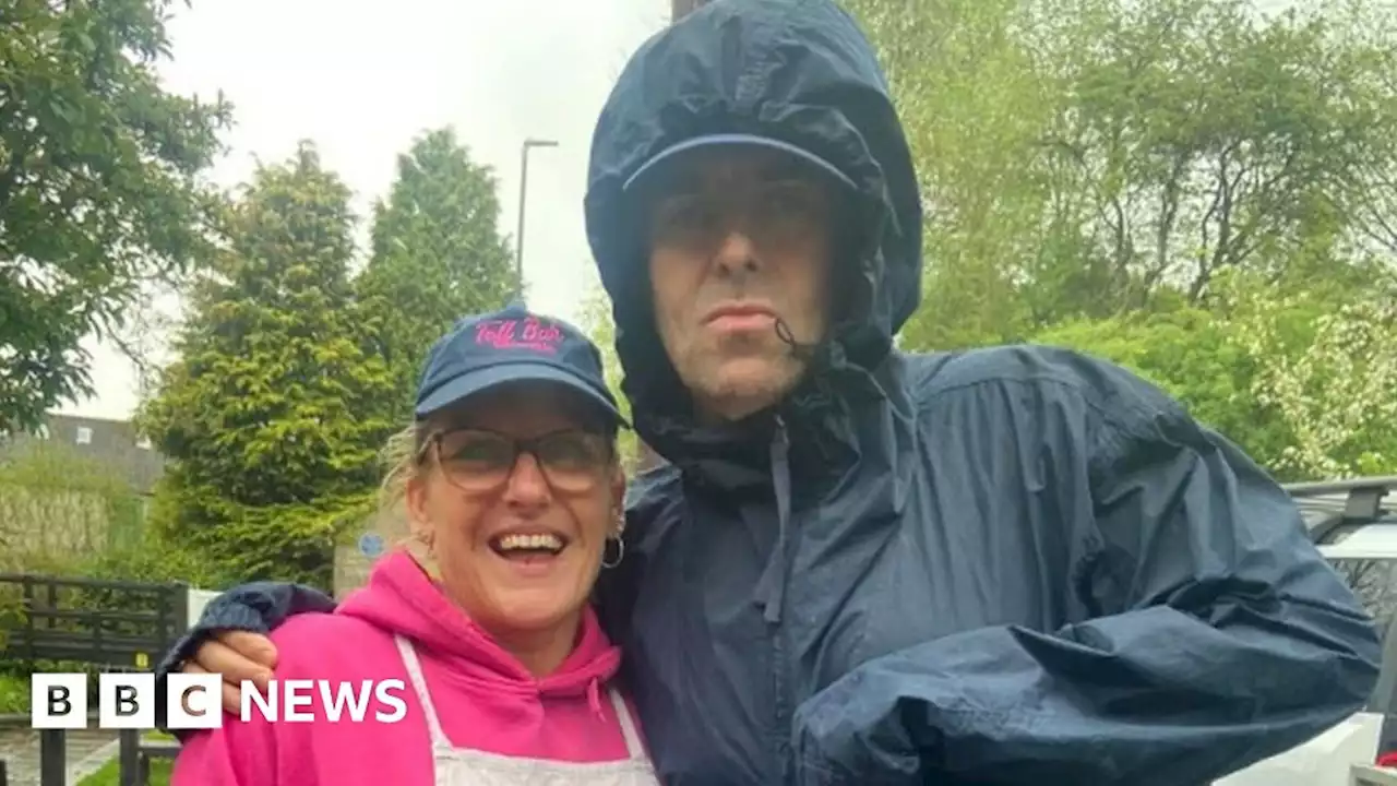 Liam Gallagher buys battered sausage in chippy