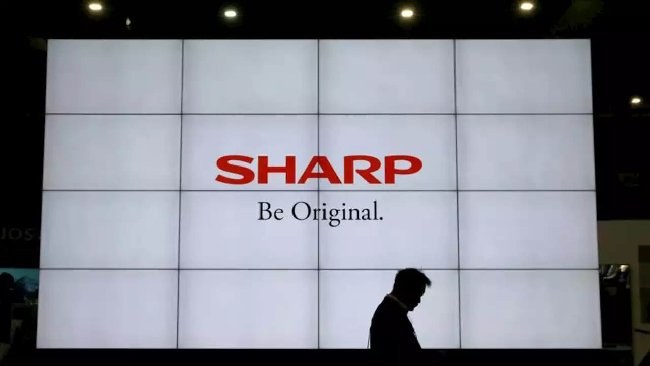 Foxconn, Sharp shares slide after Japan firm's surprise writedown