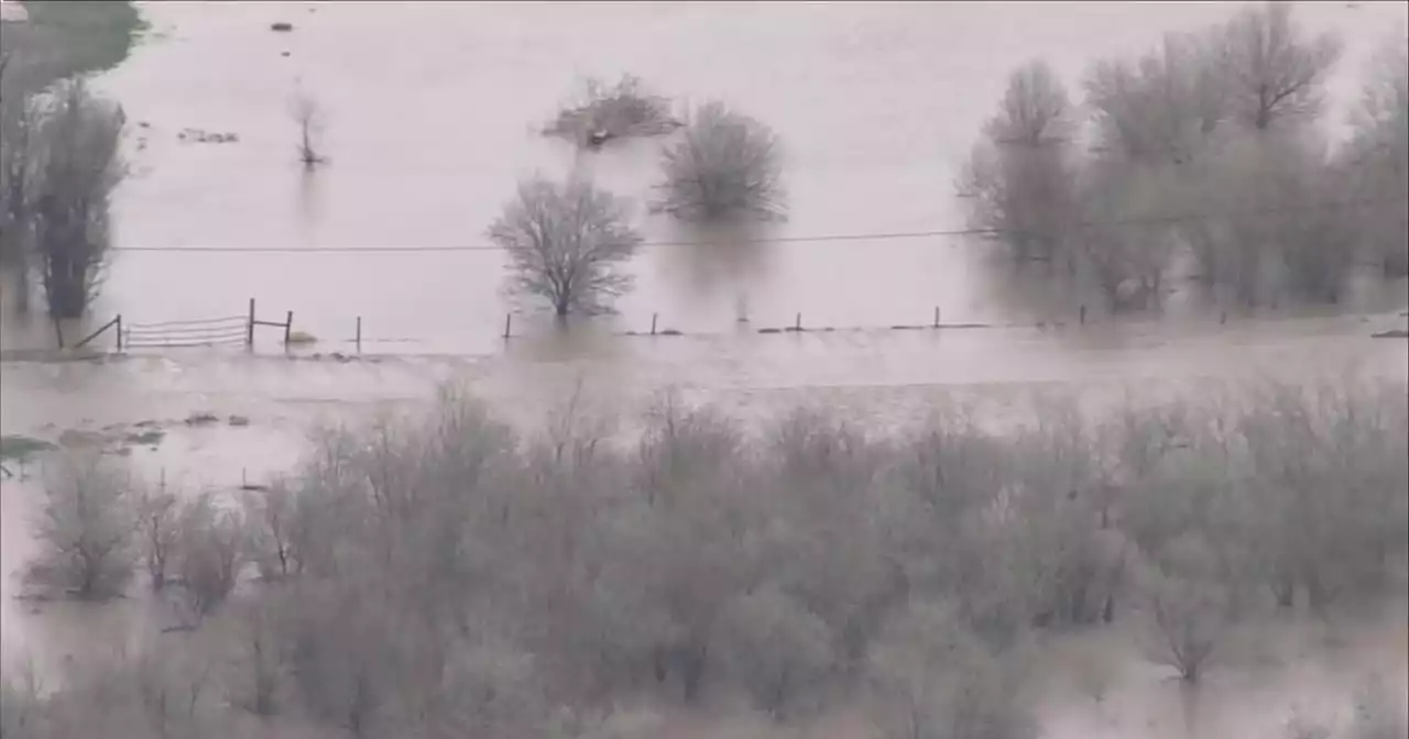 Aurora Fire crews walk half-mile in floodwaters to rescue stranded man