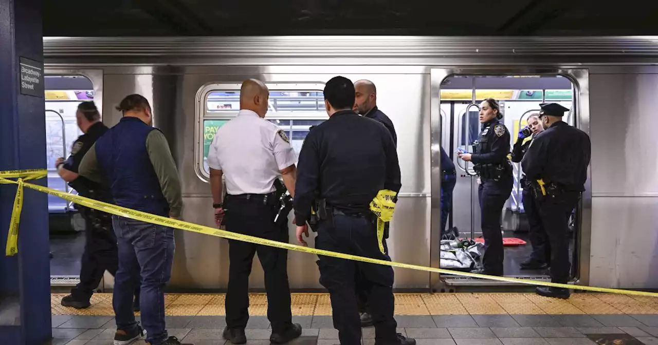 Marine veteran who choked New York subway passenger to death surrenders to authorities