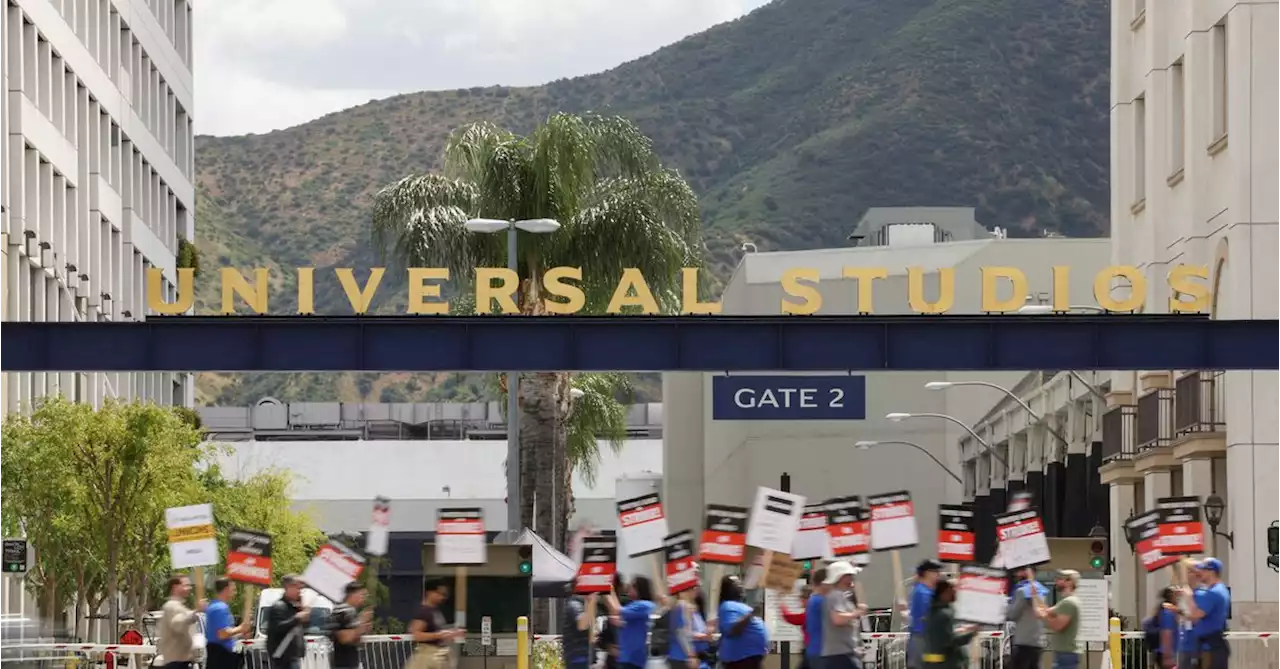 Hollywood writers try to strike a love match while picketing