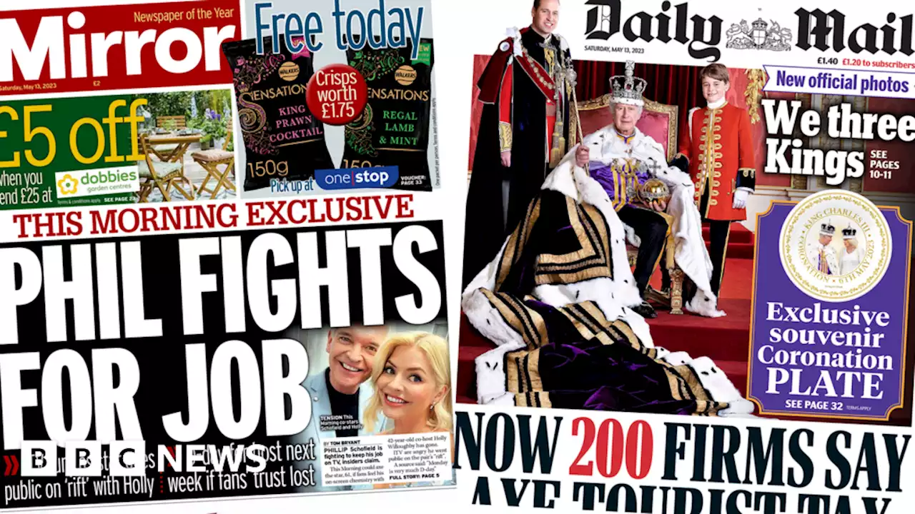 Newspaper headlines: 'We three kings' and 'Phil fights for job'