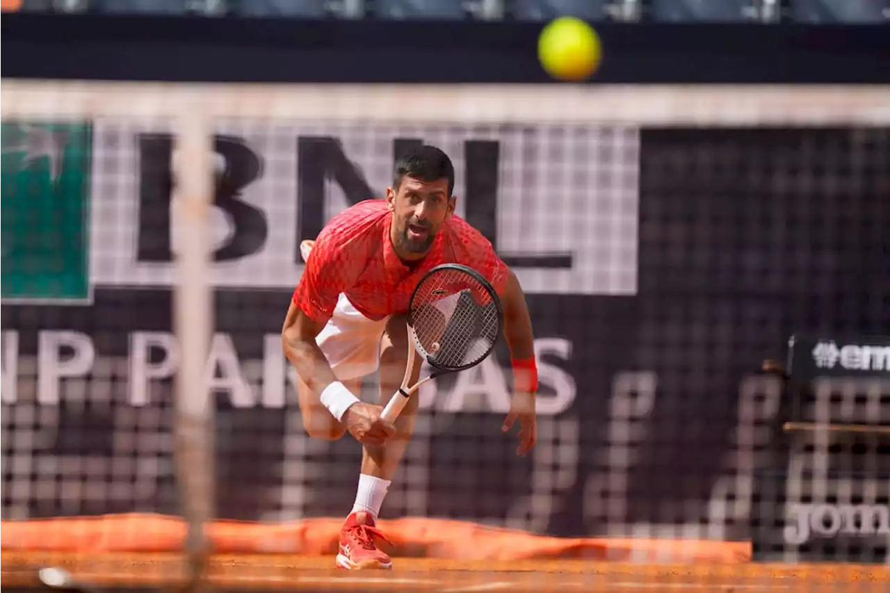 Djokovic battles past Dimitrov into last 16 of Italian Open