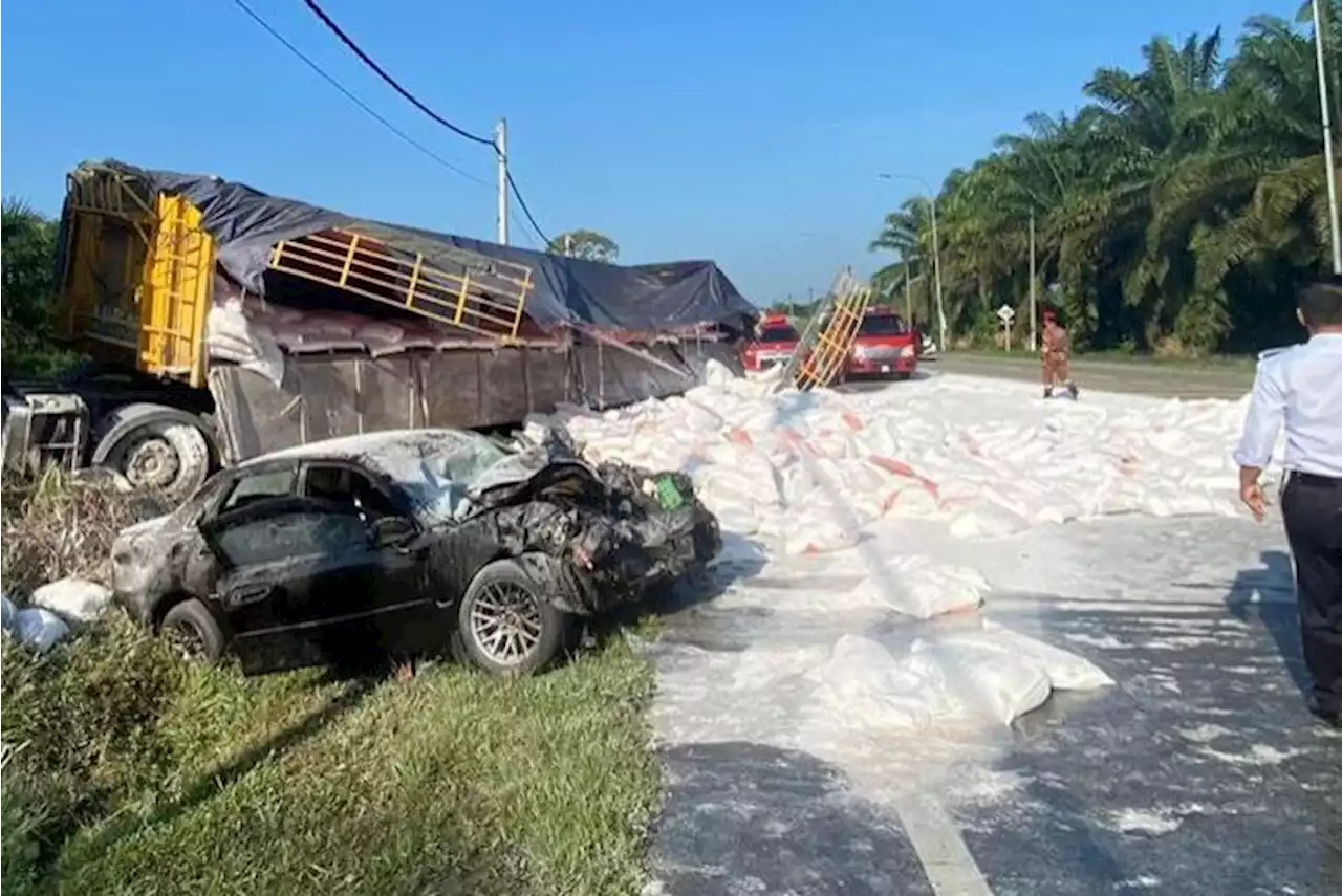 Woman killed, husband seriously hurt in Johor car-lorry crash