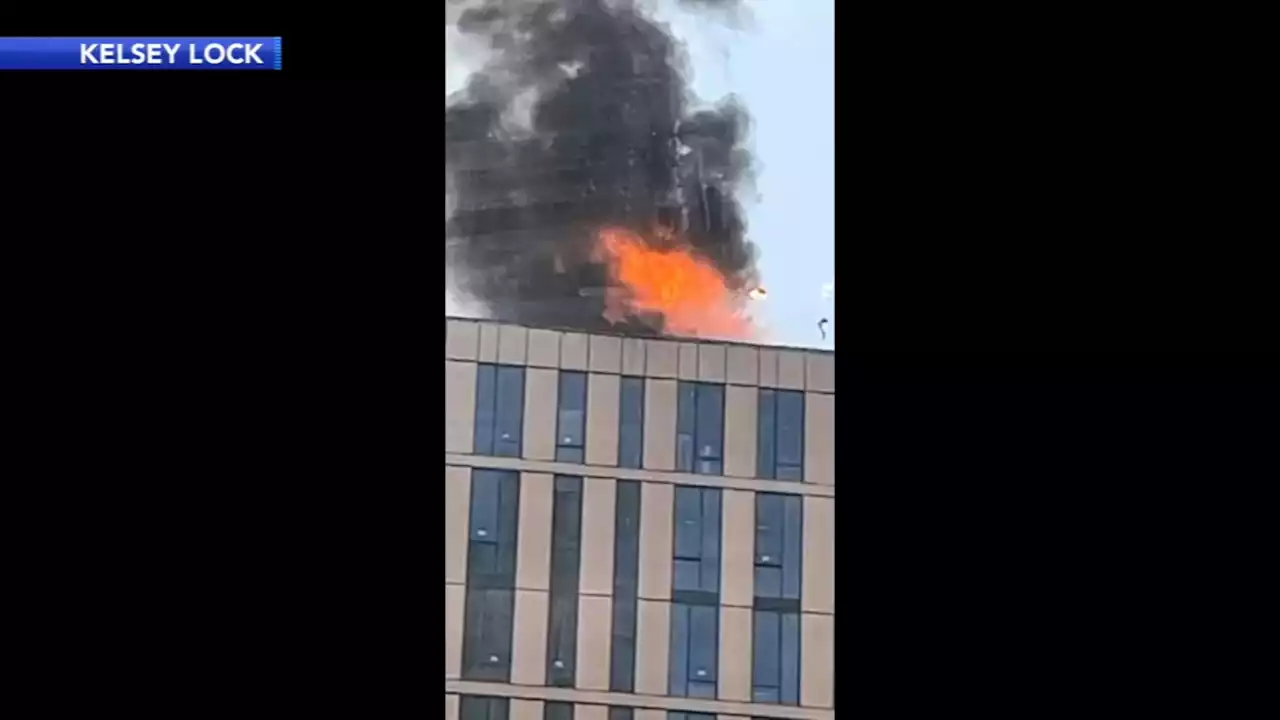 Video shows explosion during fire on top of Center City high-rise; fire now under control