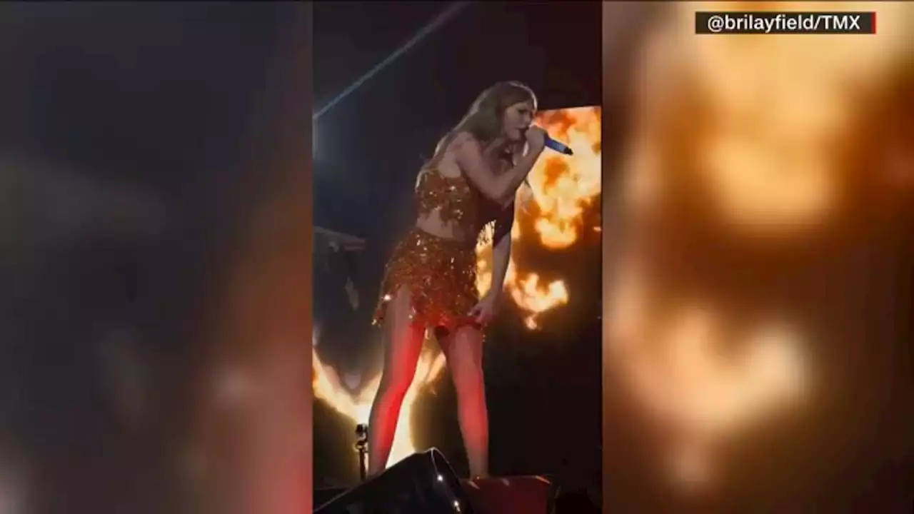 Taylor Swift seen shooing security during performance in Philadelphia