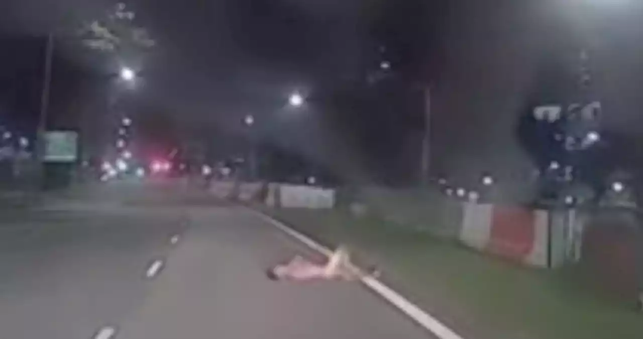 Man caught on video lying naked on Sembawang road, gets arrested