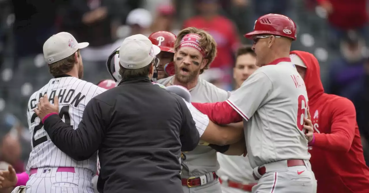 Phillies' Bryce Harper ejected after charging Rockies dugout