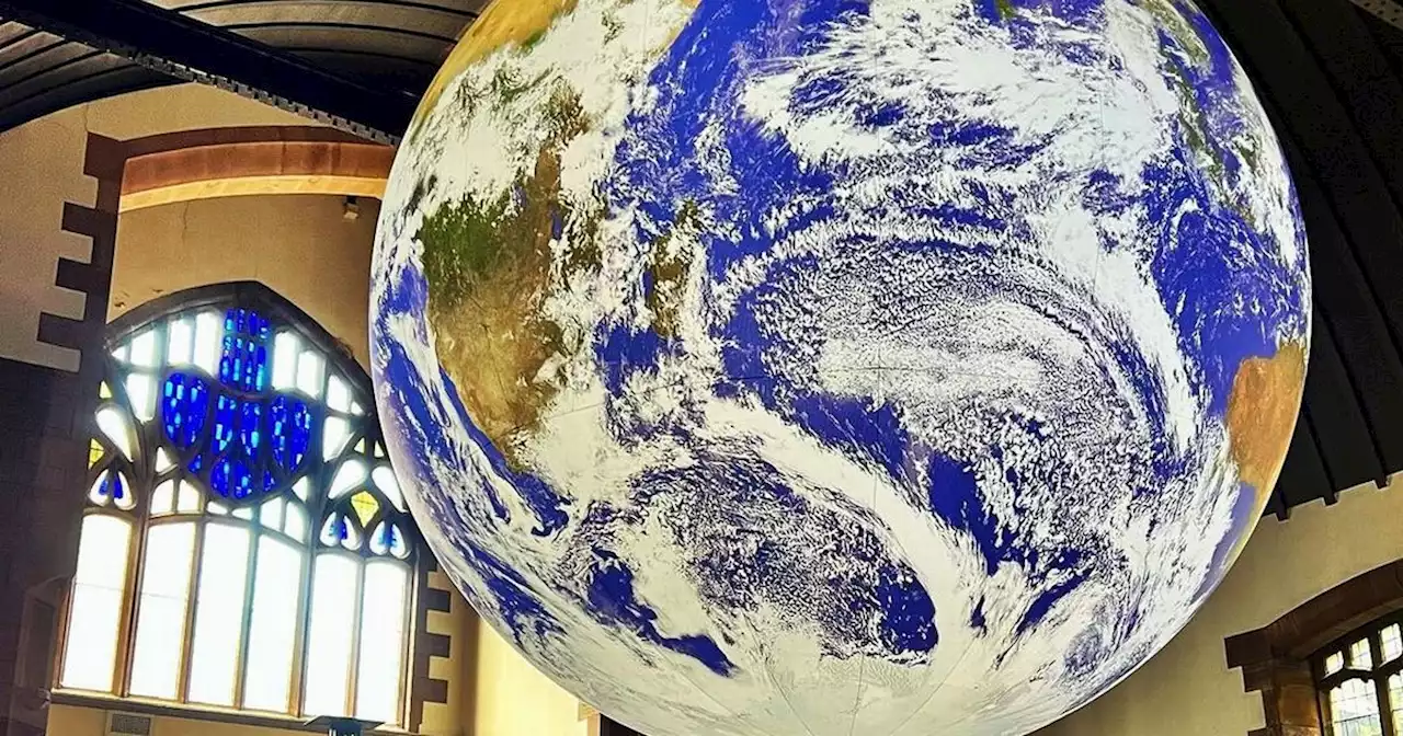 View incredible 'floating earth' installation suspended in air at Glasgow church