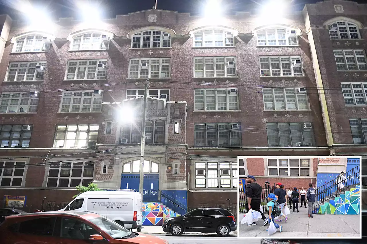 Migrants arrive at temporary shelter in Brooklyn elementary school gym