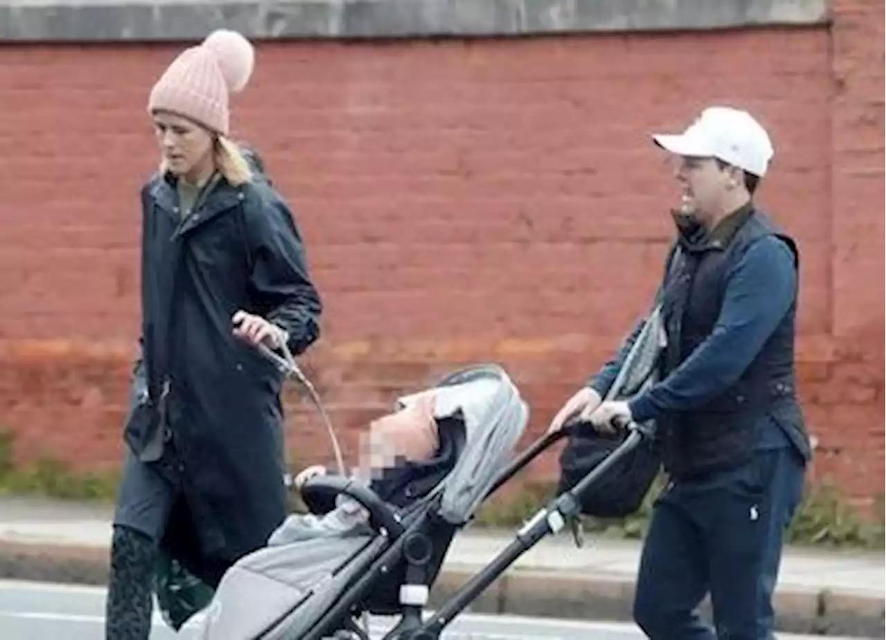 Declan Donnelly and wife Ali Astall wrap up for family stroll with baby son