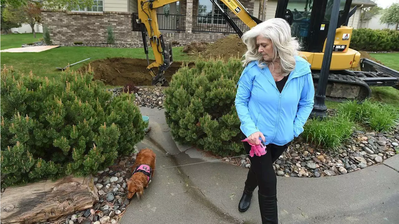 Strangers pitch in to rescue wiener dog stuck in Montana drain pipe