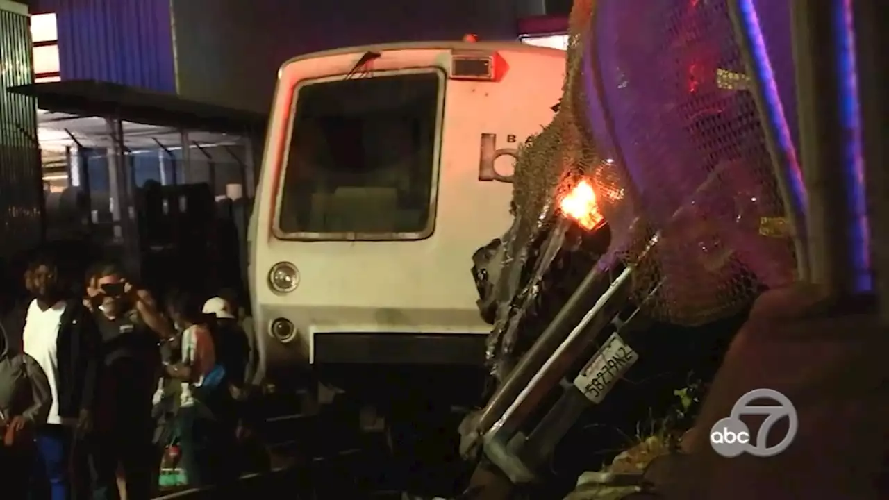 BART train hits truck crashed onto tracks in Oakland, several injuries reported, agency says