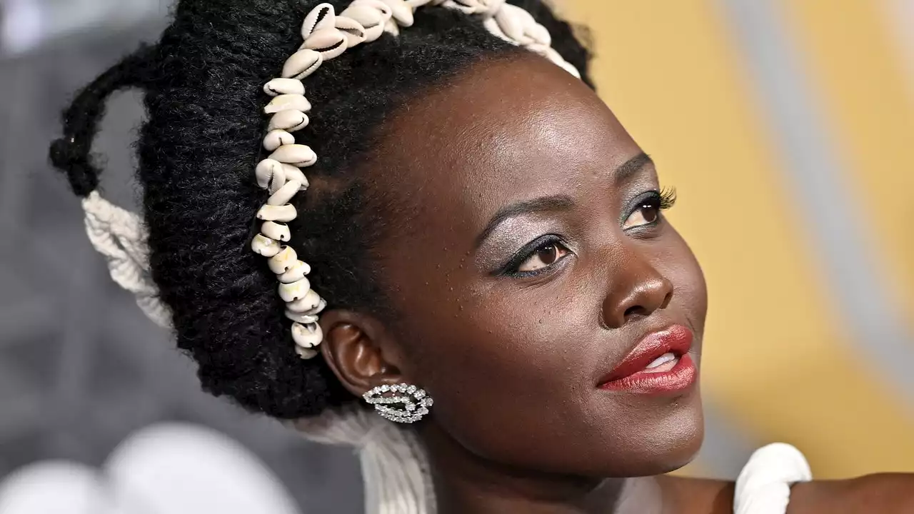 Lupita Nyong'o Used Her Shaved Head as a Canvas for an Intricate Henna Tattoo