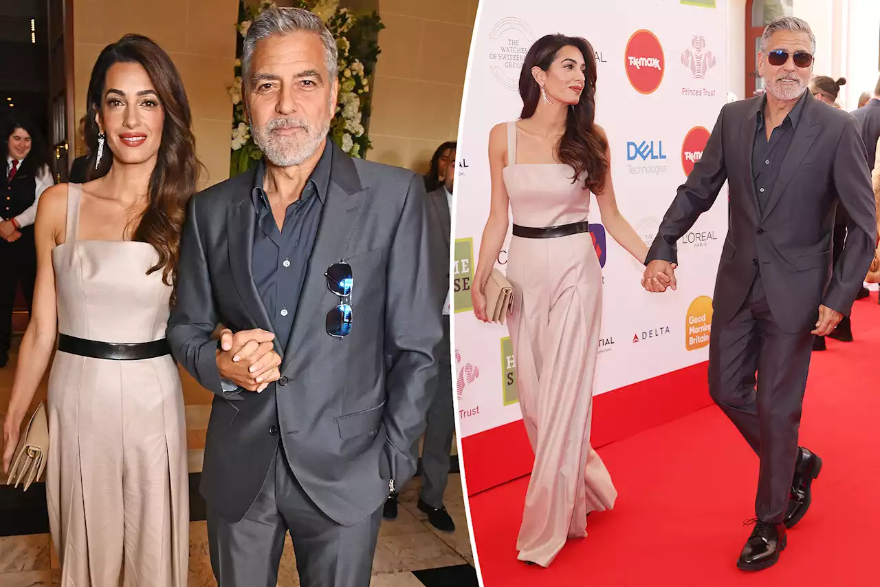 George and Amal Clooney suit up for rare red carpet appearance