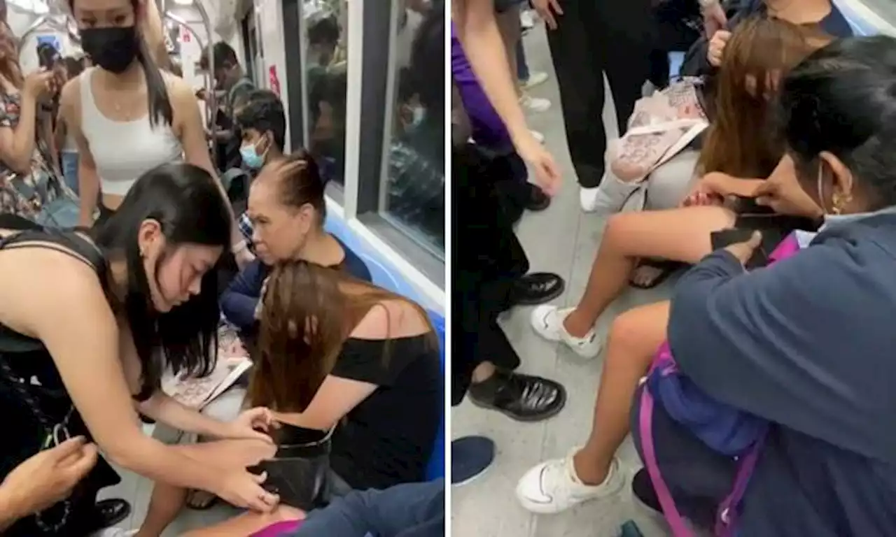 Strangers look after young woman passed out on MRT, they even help her close her purse