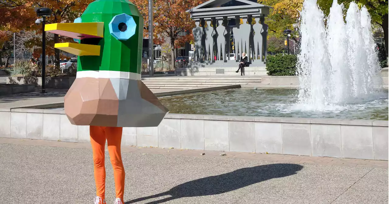 A guy in a duck costume is winning over hearts in Toronto