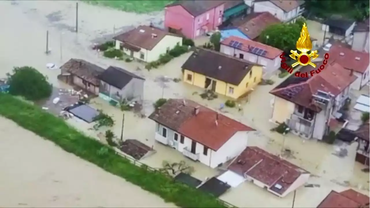 3 dead as heavy rains in northern Italy burst riverbanks, flood towns