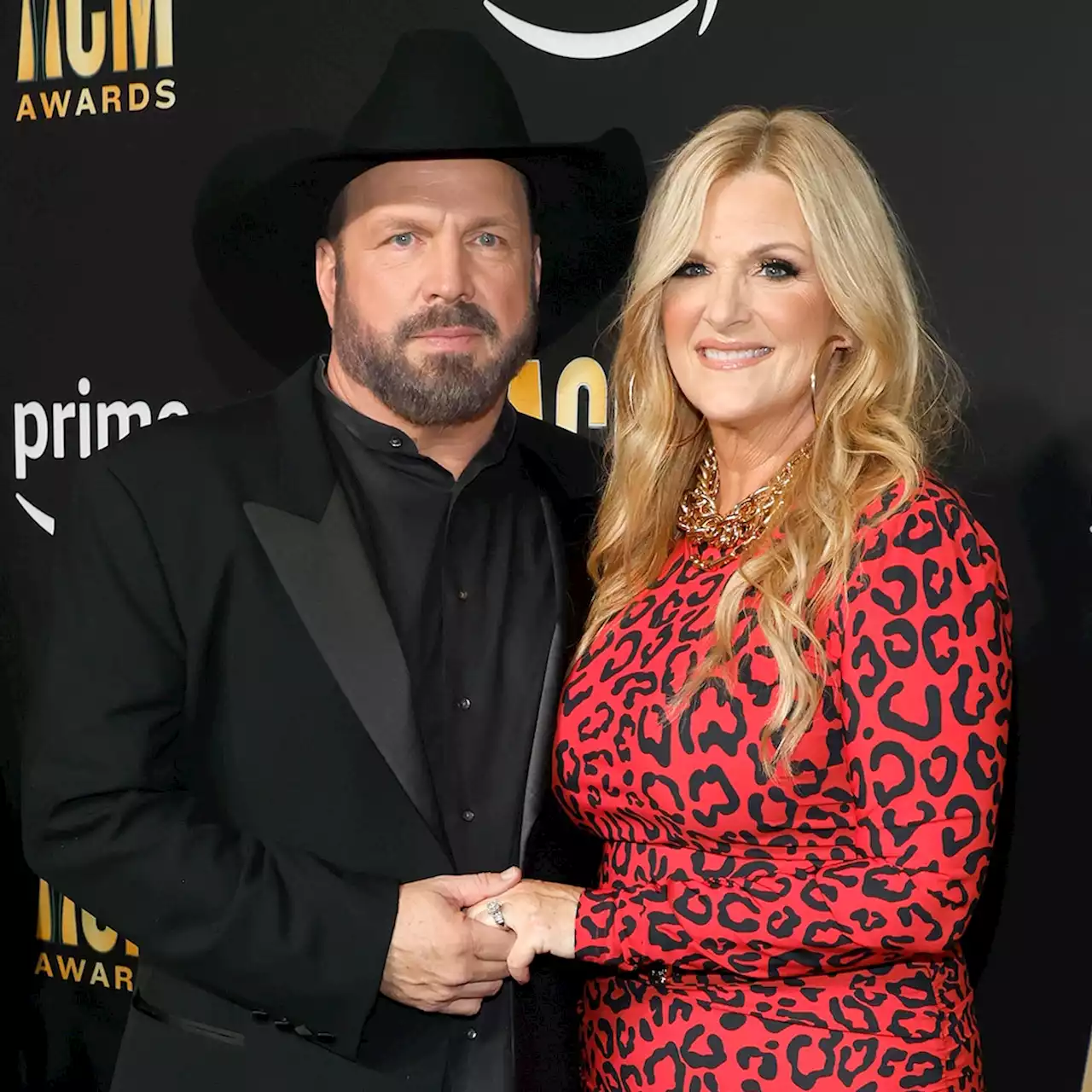 Trisha Yearwood Shares How Husband Garth Brooks Flirts With Her Over Text - E! Online