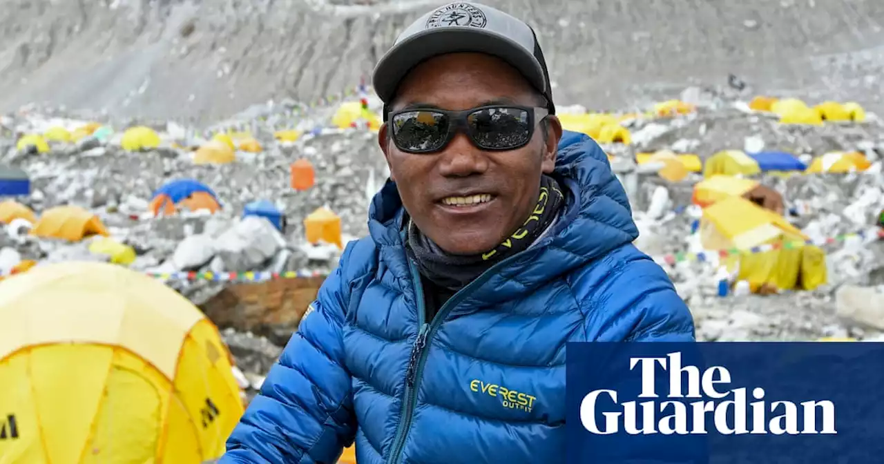 Nepali sherpa scales summit of Mount Everest for record 27th time