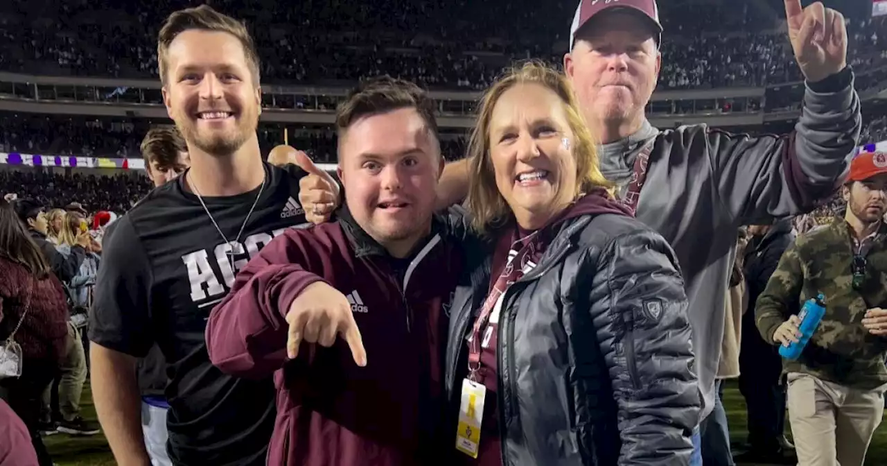 He made history as a college football player with Down syndrome. Now, he's suing his school