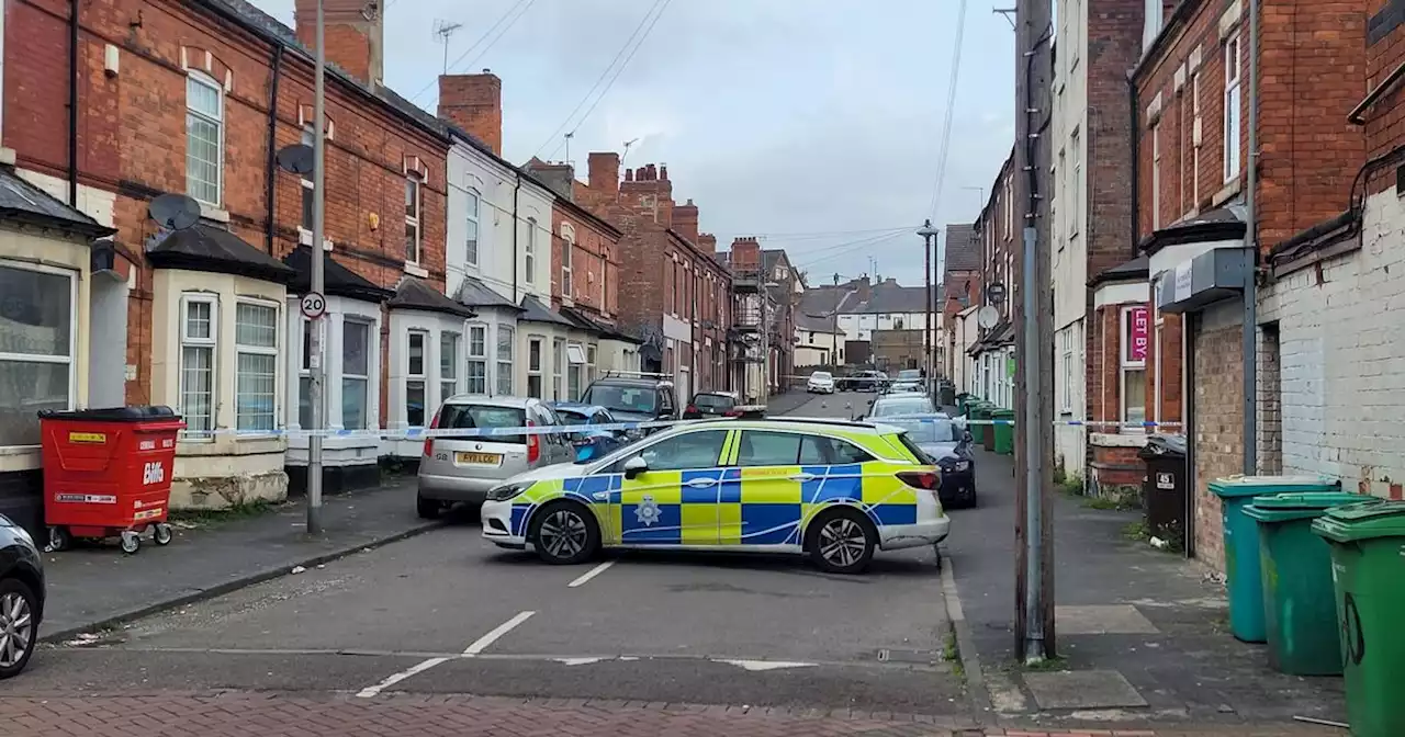 Police cordon remains in place after men 'fight with weapons'