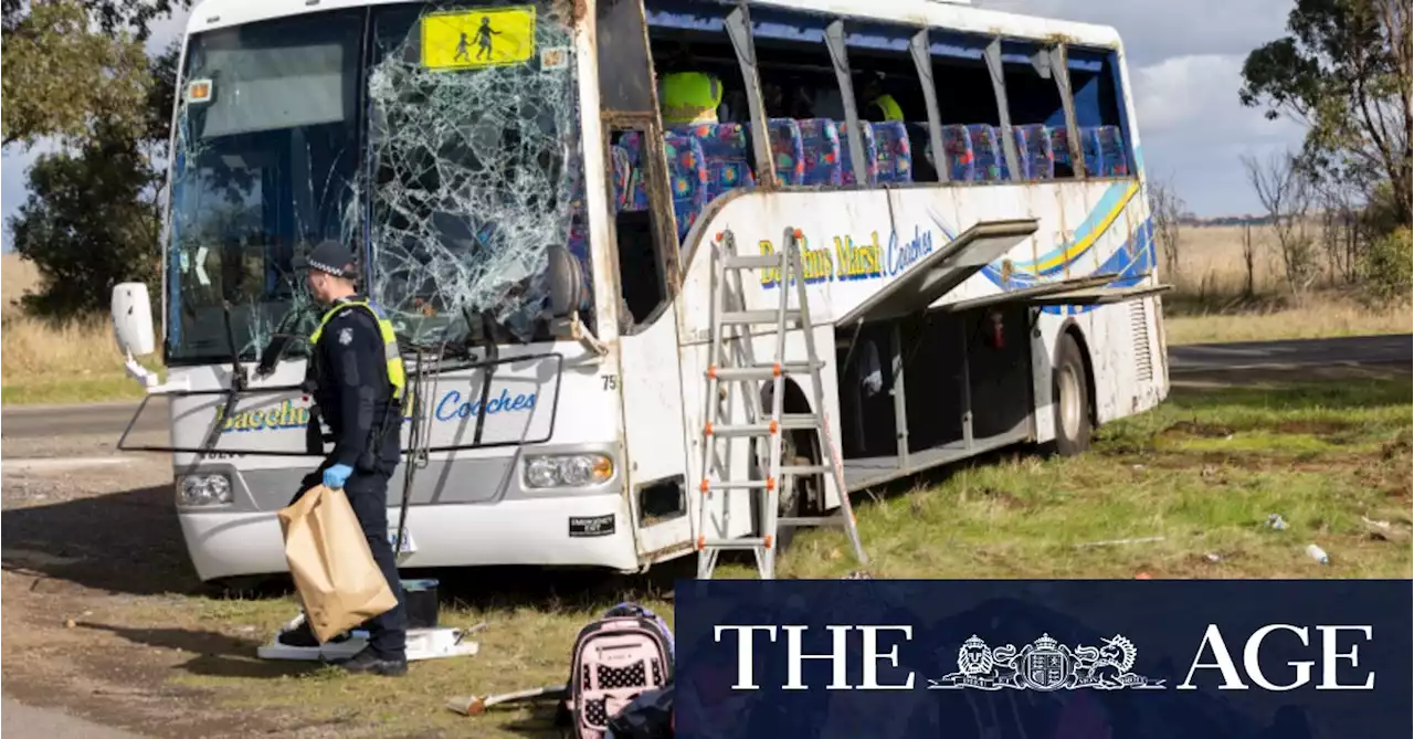 Truck driver charged over ‘absolutely horrific’ school bus crash that injured 10 children