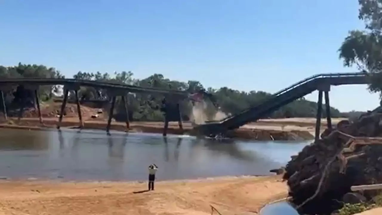 Hopes dramatic demolition of Fitzroy River bridge will mark 'turning point' for flood-ravaged community