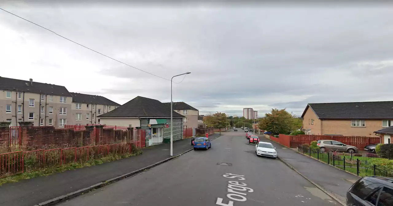 Armed robbery in Glasgow leaves staff 'shaken' as police hunt for raiders