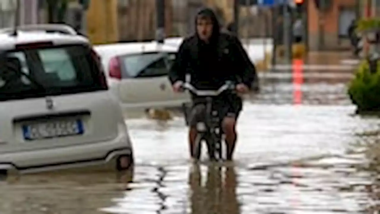 Intense flooding in Italy kills at least 8, forces cancellation of Formula One race