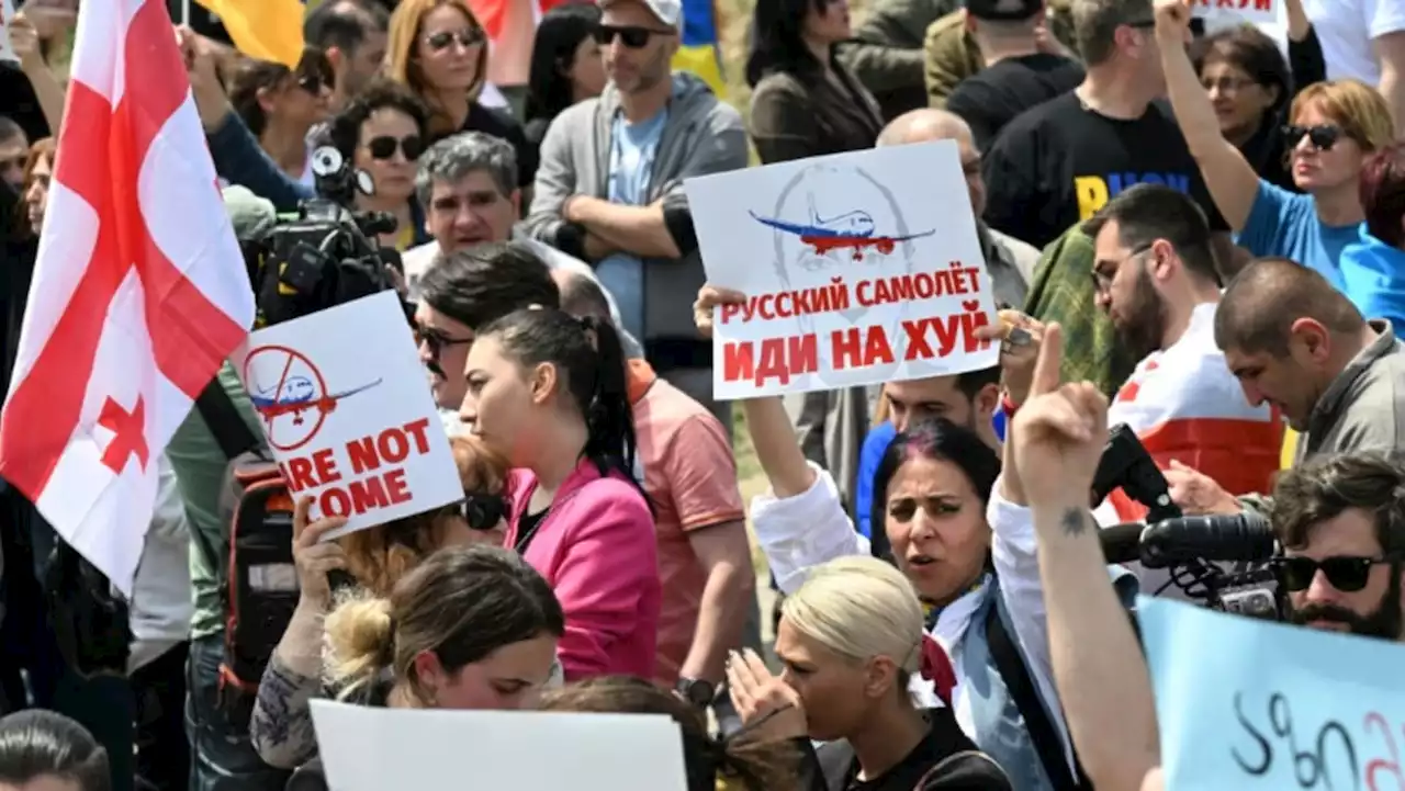 Protests greet first Russian plane to land in Georgia in years