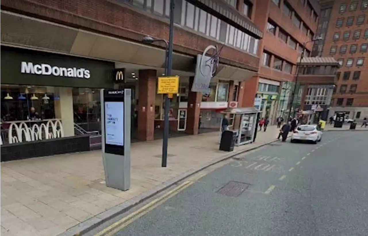 Motorist mounted pavement outside Leeds McDonald's to drive at street brawlers