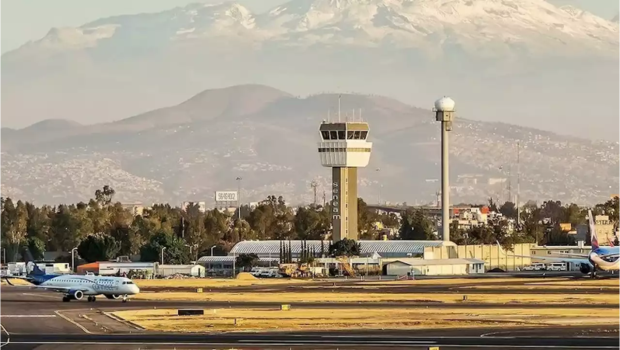 Suspenden operaciones en AICM por fuertes lluvias