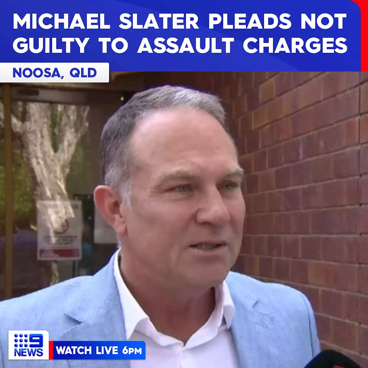 Ex-cricketer Michael Slater pleads not guilty to assaulting, obstructing police