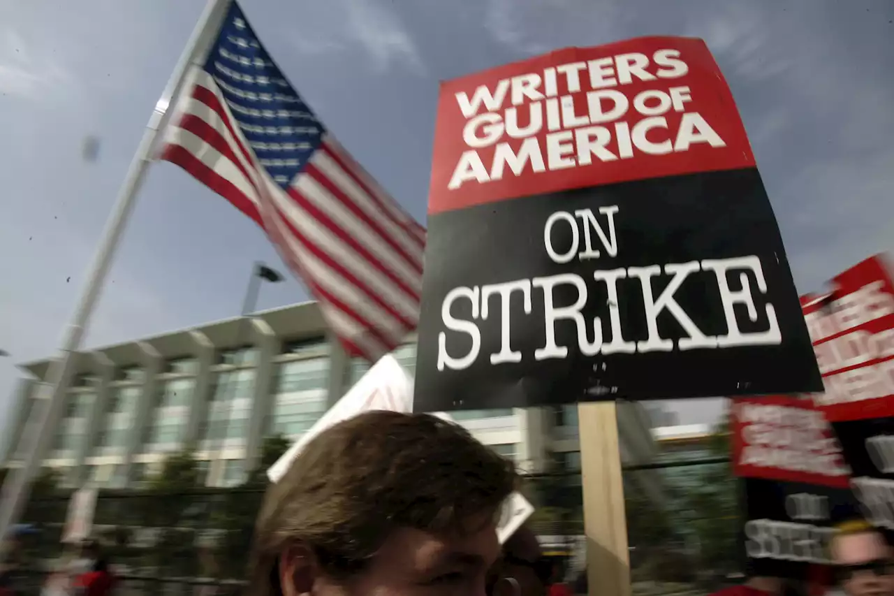 Hollywood writers begin strike, late-night shows go dark