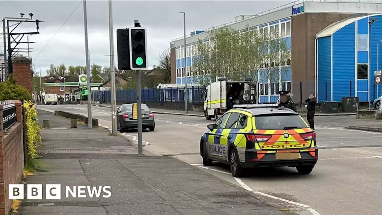 Belfast: Man charged after car crashes into police station