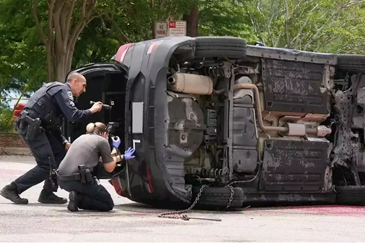 Cops pull bullet-riddled car from Texas lake where four other bodies were found