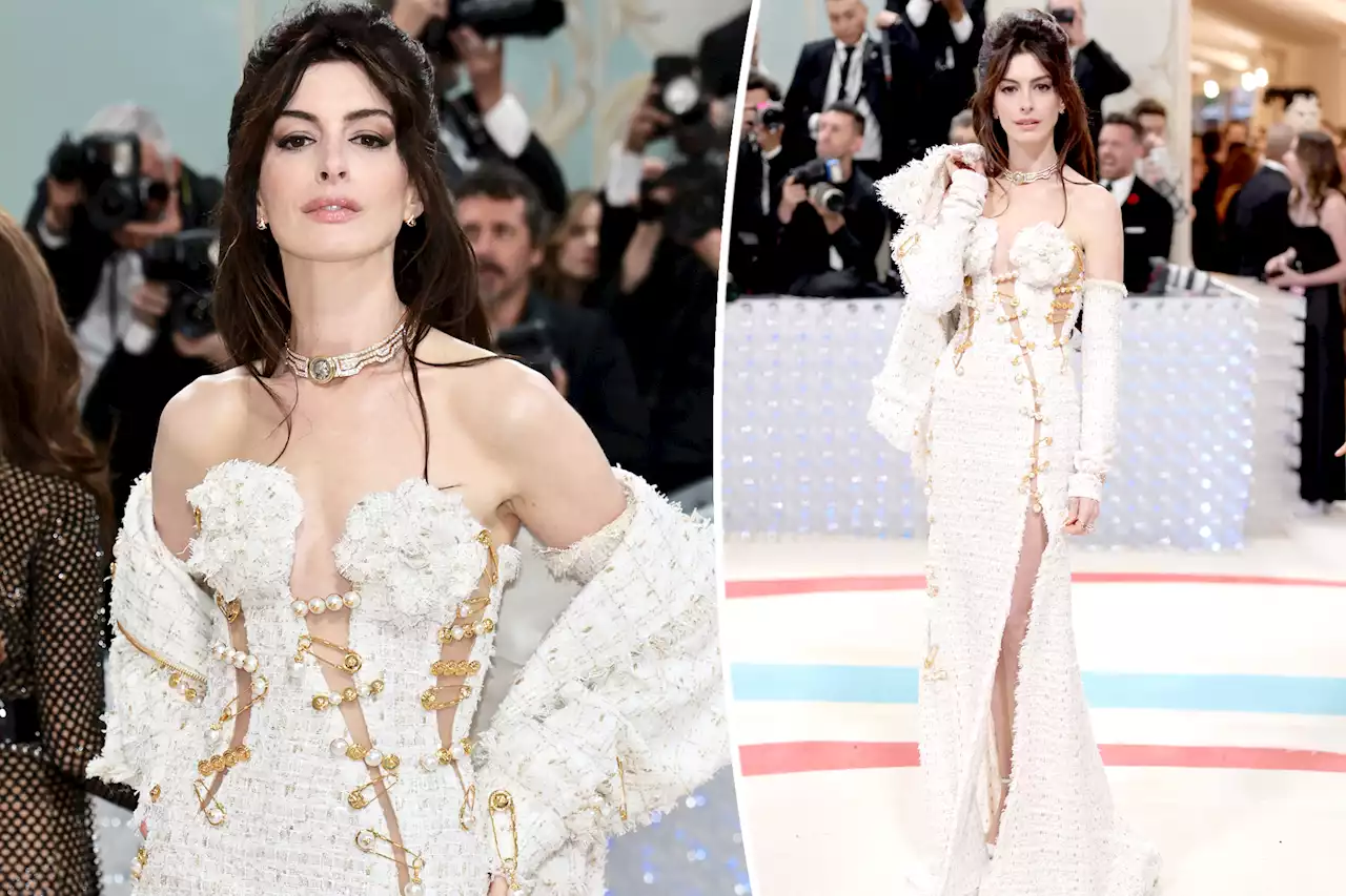 Anne Hathaway gives ‘90s energy in a Versace safety pin dress at Met Gala 2023