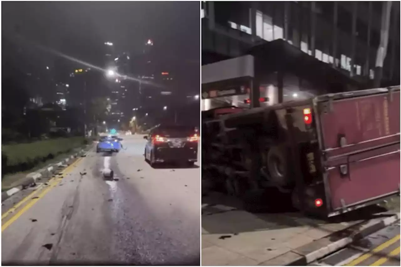 Two people injured in accident involving taxi and lorry near Suntec City