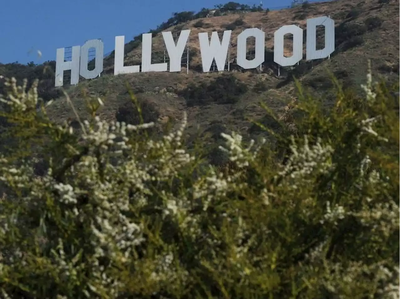 'PENCILS DOWN': Hollywood writers, slamming 'gig economy,' to go on strike