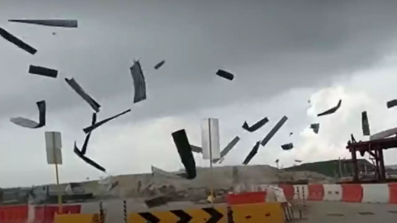 Changi Airport Group says 'unusual' weather event caused flying debris at construction site; no injuries reported