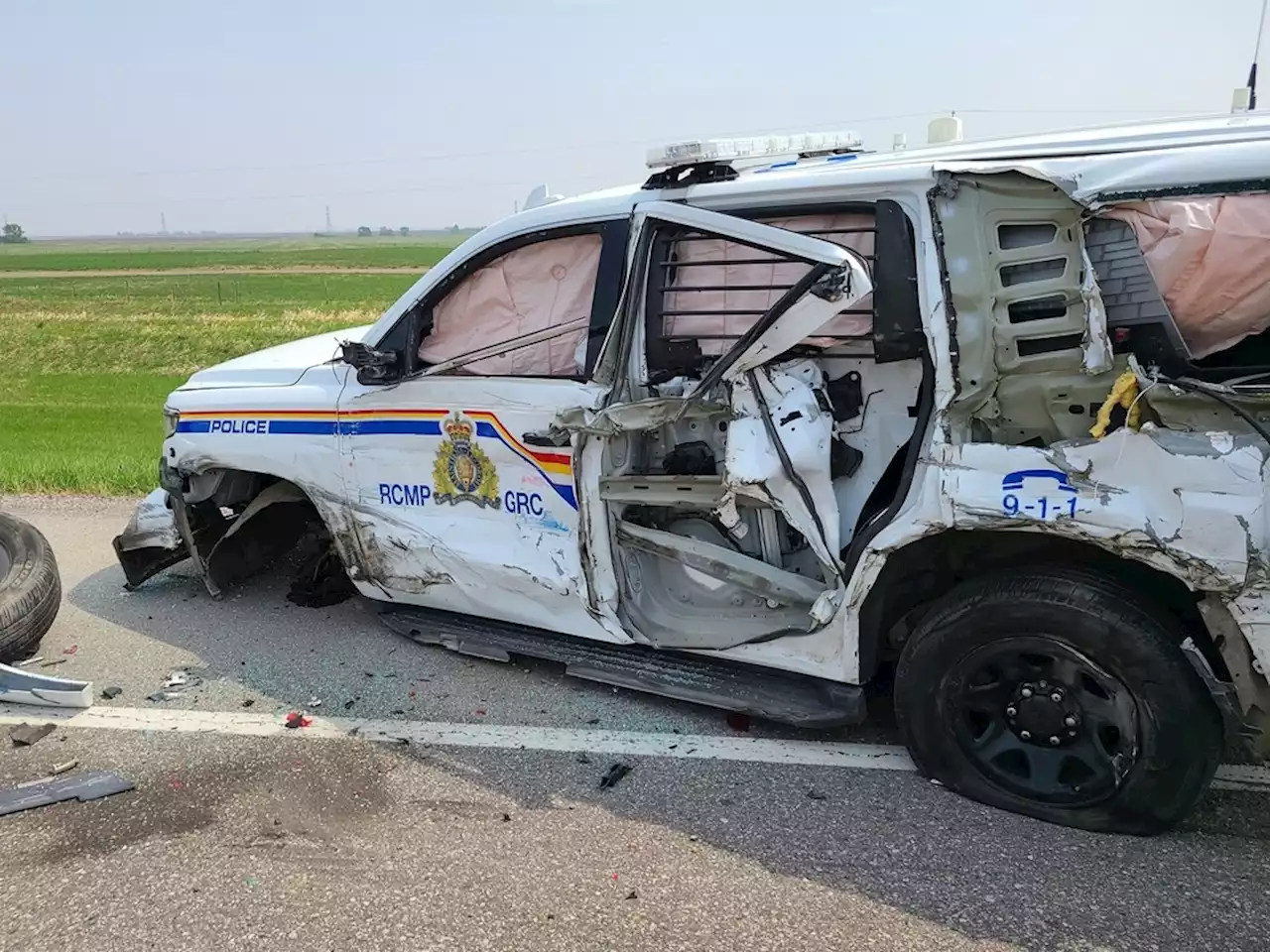 Officer not seriously harmed after semi slams into RCMP cruiser