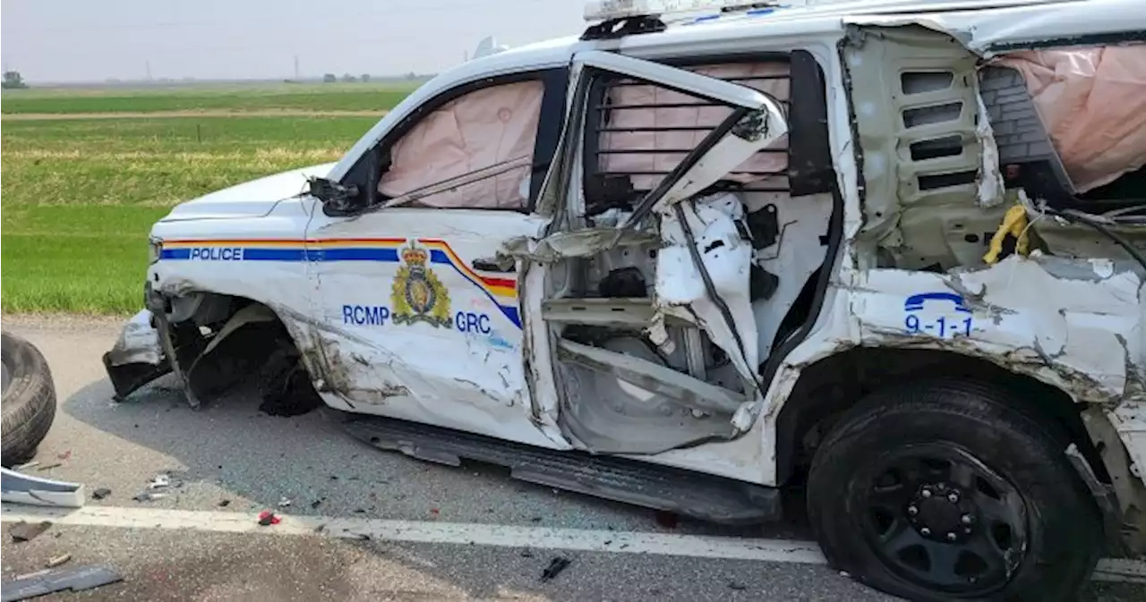 Semi slams into RCMP unit during southern Alta. highway traffic stop, officer relatively unscathed | Globalnews.ca