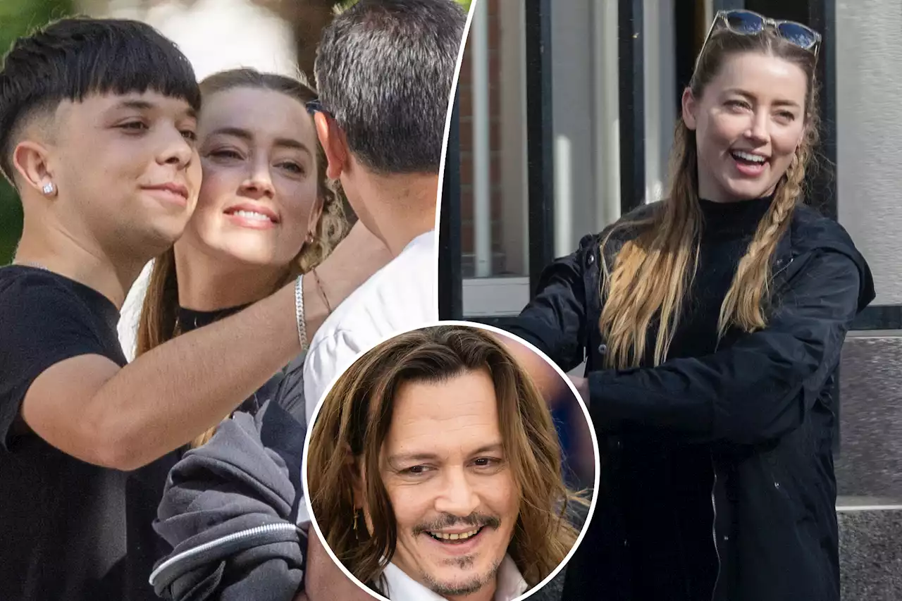 Amber Heard looks relaxed, happy in Madrid as Johnny Depp faces teeth criticism