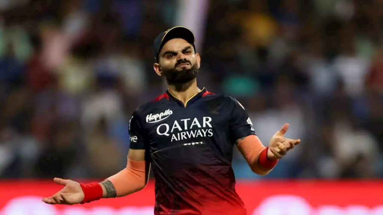 Kohli record ton in vain as Mumbai pip Bangalore to final IPL playoff spot