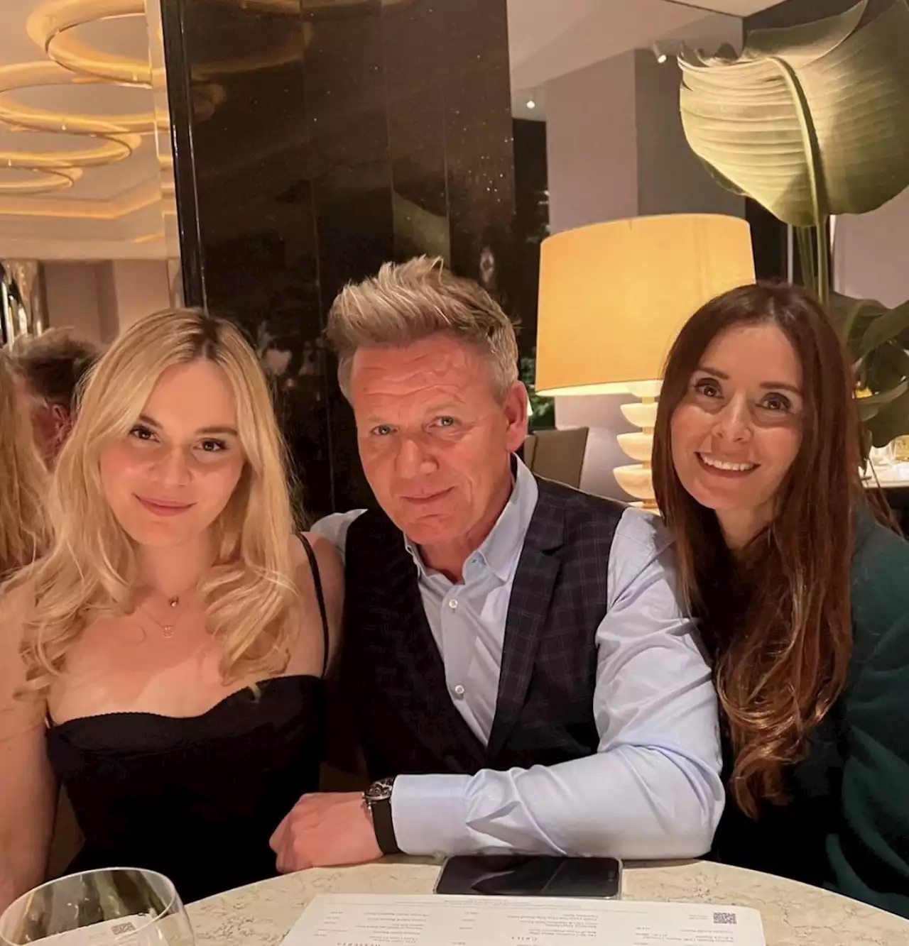 Gordon Ramsay poses with wife and daughter as they lunch at his restaurant