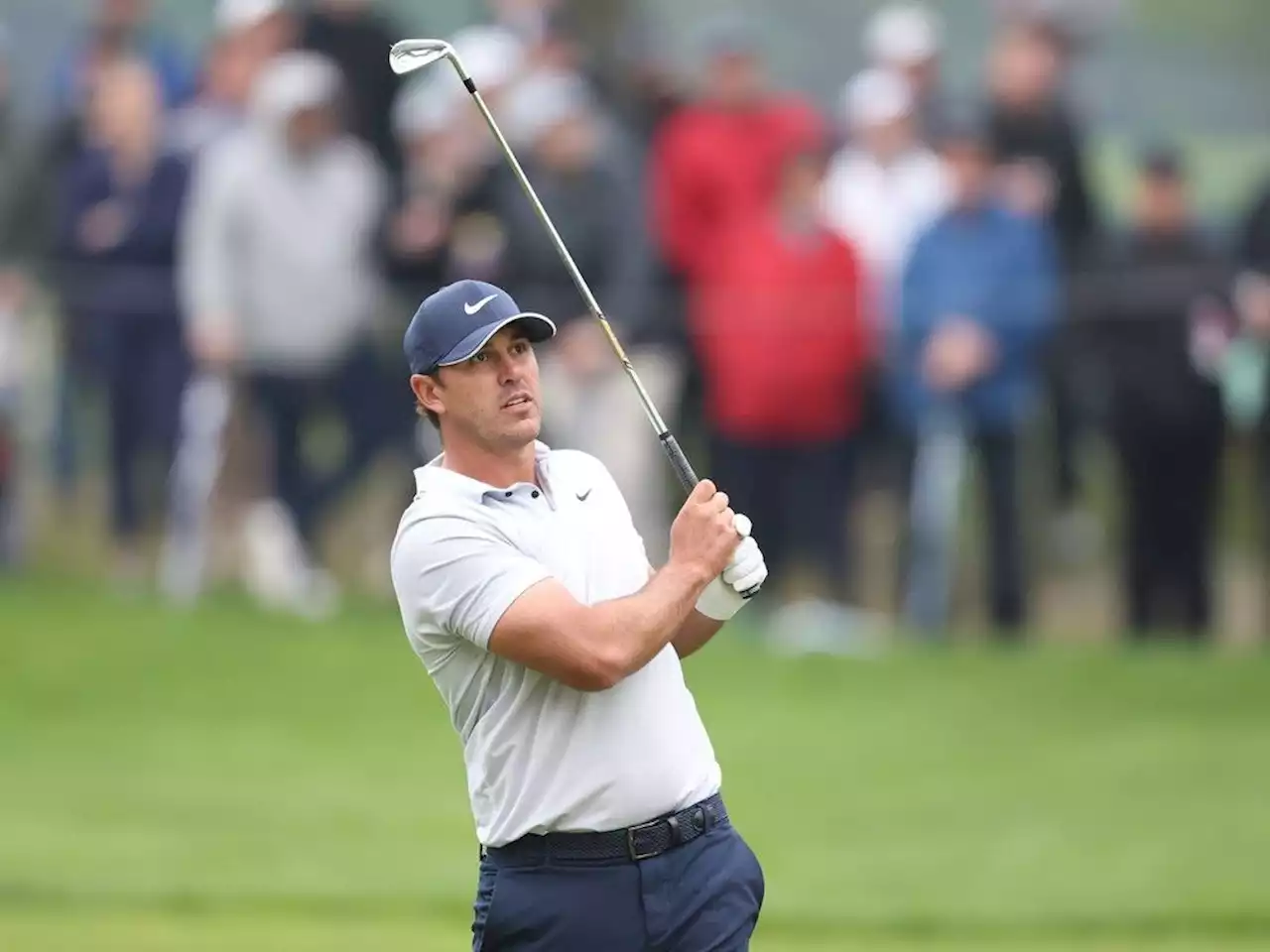 Brooks Koepka powers ahead at waterlogged PGA Championship