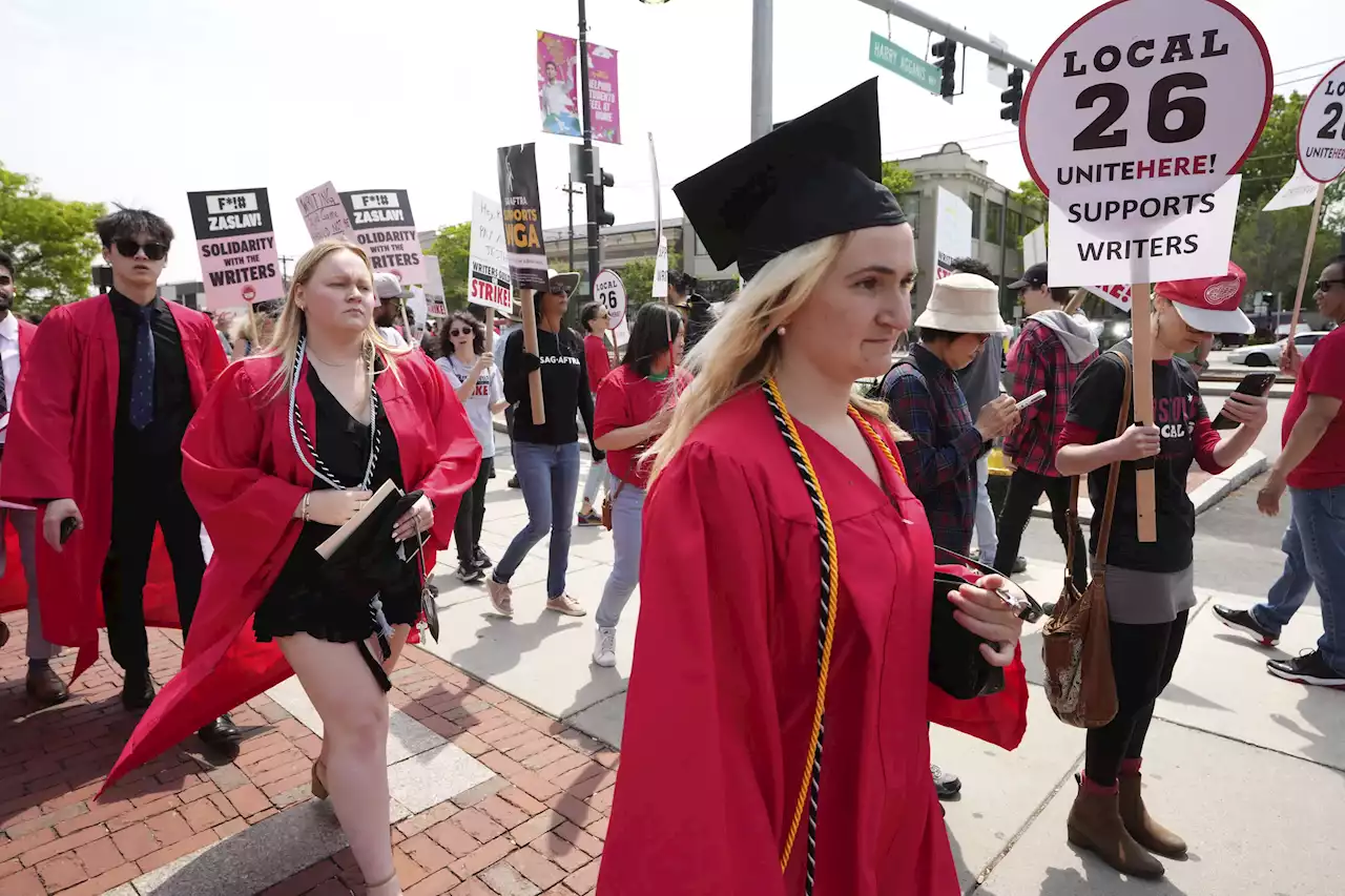 Warner CEO booed at Boston University as supporters of writers' strike picket outside