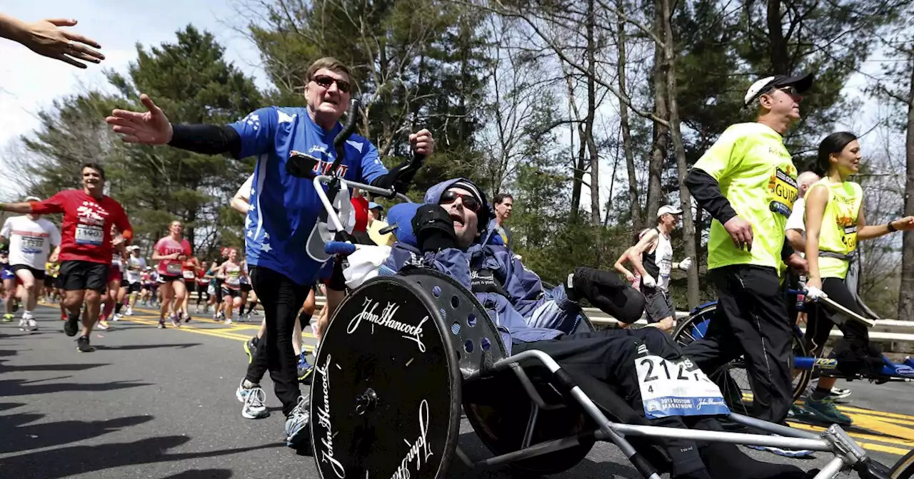 Rick Hoyt, who became a Boston Marathon fixture with father pushing wheelchair, has died at 61