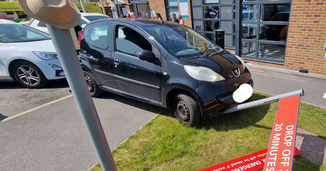 Car smashes into drop-off sign outside A&E as driver arrested